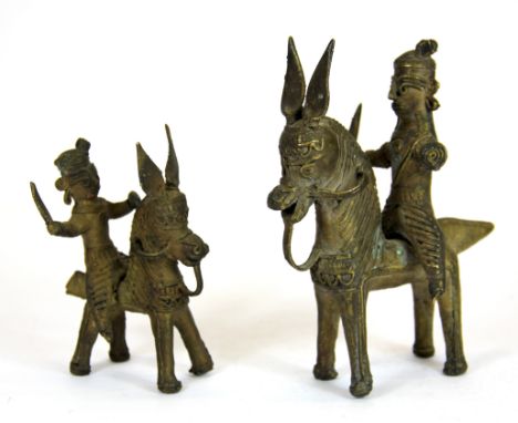 Two South American bronze figures of male characters with weapons riding lama, H. 16cm.