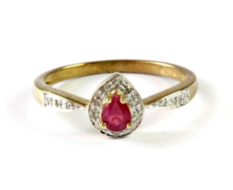 A 9ct yellow gold pear cut ruby and diamond set cluster ring, (P.5).