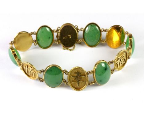 A yellow metal (tested 14ct gold, Chinese hallmark) jade set bracelet, L. 19cm.