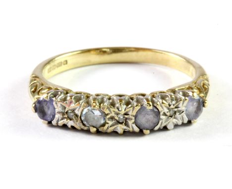 A 9ct yellow gold stone set ring, (N.5).