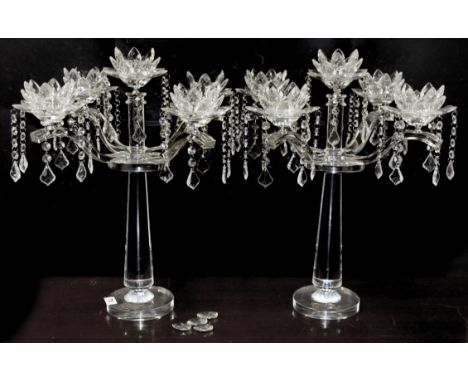 A pair of large four branch crystal candelabra, H. 52cm.