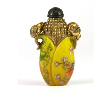 A Chinese enamelled and gilt Peking glass snuff bottle with bronze stopper, H. 7.5cm.