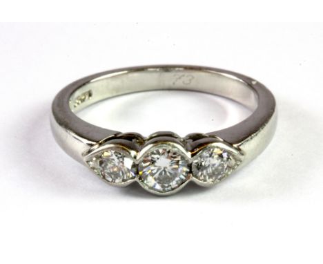 A 950 platinum ring set with three brilliant cut diamonds, approx. 0.73ct, (N.5).