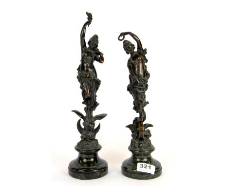 A pair of Art Nouveau French bronze figures on granite bases, H. 30cm.