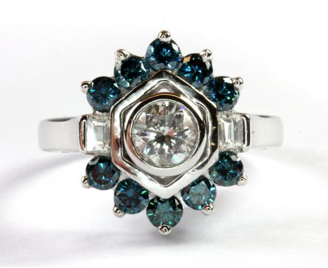 A 14ct white gold cluster ring set with a centre 0.77ct diamond surrounded by fancy blue and white diamonds, (P).