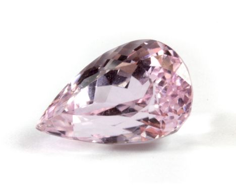 An unmounted 8.99ct pear cut light pink kunzite, 15.8 x 10 x 9.1cm.