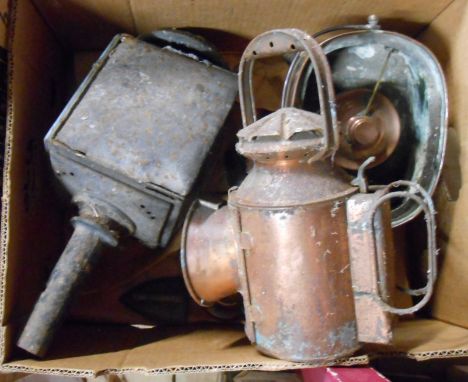 A box containing a quantity of metalware comprising copper warmer, railway signaling lamp, old carriage lamp and three small 