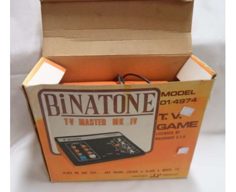 A 1970's Binatone TV Master Mark IV game in original box with instructions and old guarantee