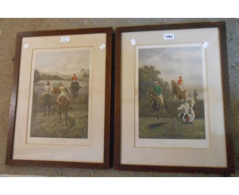 A pair of old oak framed hand coloured horse racing etchings, one entitled 'The First Fence', the other 'A Warm Corner'