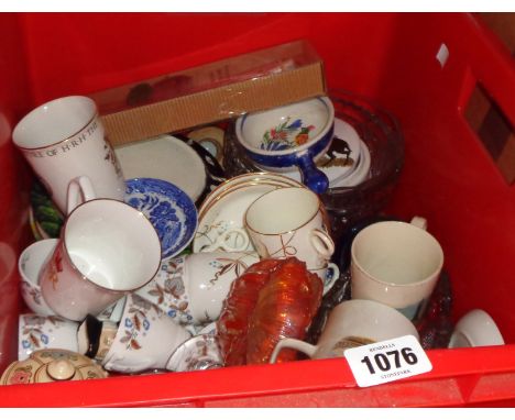 A crate containing a quantity of ceramic and glass items including Minton bone china cups and saucers, etc.