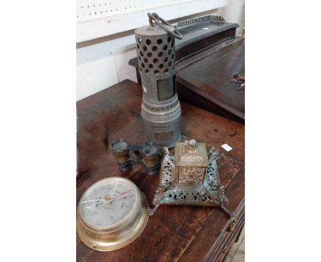A box containing a small quantity of metalware comprising the Wolf radiator lamp, Rococo brass inkwell, etc.