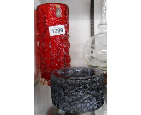 A vintage 9.5cm Whitefriars cylindrical bark vase in the red colourway designed by Geoffery Baxter with original paper label 