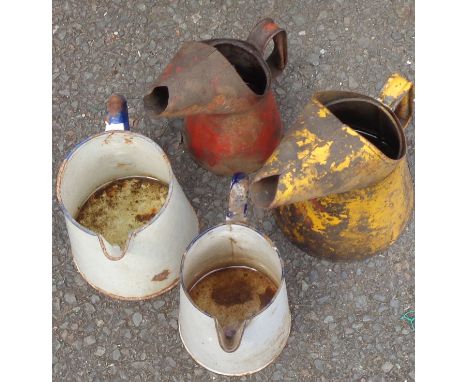 Two vintage oil cans - sold with two enamel jugs