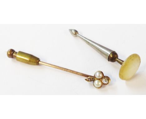 An antique diamond and seed pearls set s An antique yellow metal rose diamond and seed pearl set stick pin - sold with a plat