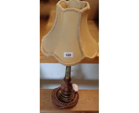 A vintage painted and lacquered wooden table lamp of candlestick form with shade