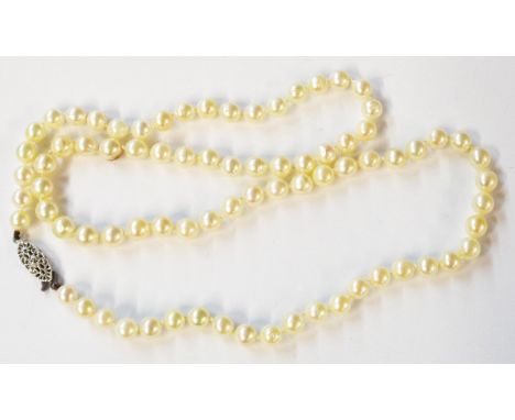 A single string cultured pearl necklace with marked sterling silver clasp