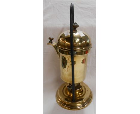 An antique brass spirit burner coffee percolator of swing form with wrought iron loop stand and turned wooden handles