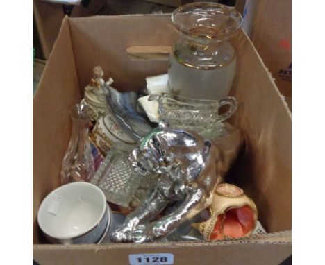 A box containing a quantity of ceramic and other collectable items including large resin silver lustre decorated lioness figu