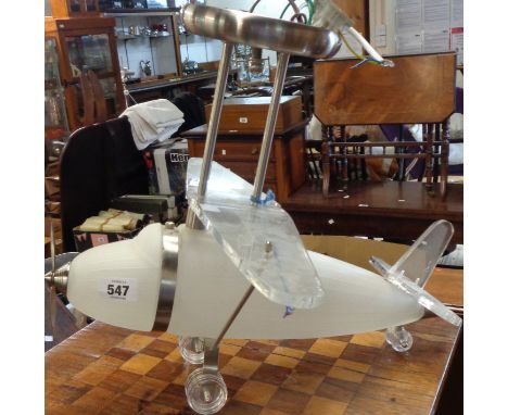 A decorative Loxton Lighting Ltd. aeroplane form ceiling light