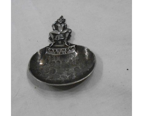 A silver caddy spoon with 'Dartmoor Pixie' decorated handle - Birmingham 1928