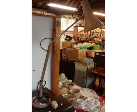 A vintage Anglepoise lamp in the beige colourway