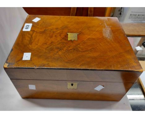 A Victorian walnut veneer writing slope with ebony stringing and fitted interior with tooled leather writing surface, inkwell