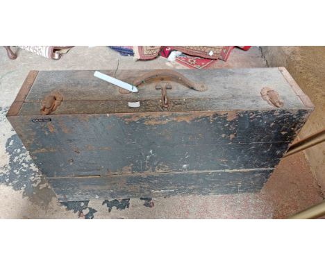 An old painted mixed wood carpenter's tool chest with drawer fitted interior containing a quantity of assorted tools includin