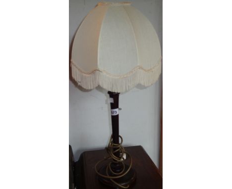 A vintage turned wood table lamp of candlestick form - with shade