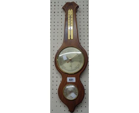 A vintage polished wood framed banjo barometer/thermometer with hygrometer dial under and aneroid works