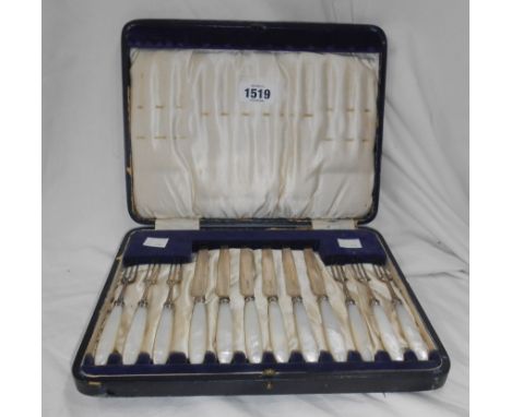 A cased set of six each silver fruit knives and forks with mother-of-pearl handles - Sheffield 1919