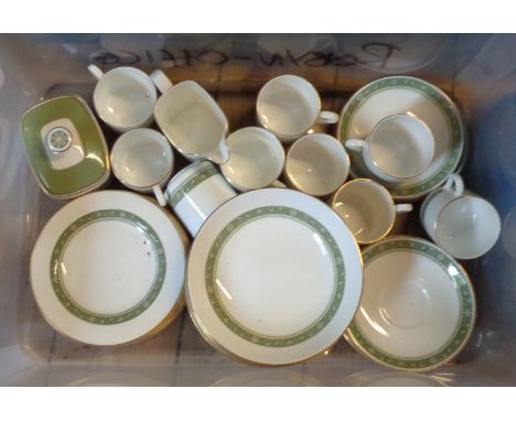 A crate containing a quantity of Royal Doulton Rondelay teaware including sucrier, coffee cups and saucers, cereal bowls, etc