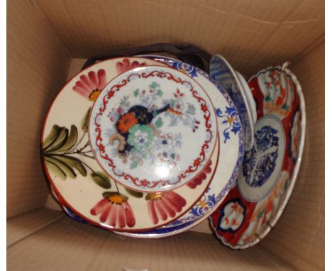 A box containing a quantity of assorted ceramic plates including Japanese Imari, Amhurst pattern, etc.