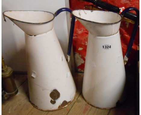 Two old enamel milk jugs