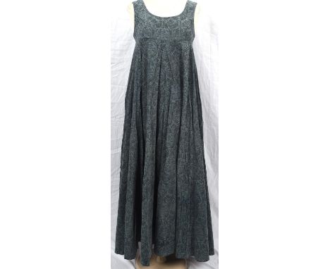 LAURA ASHLEY An early black and white label "Made in Wales" late 1960s early 1970s denim-blue needlecord prairie maxi-pinafor
