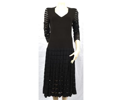 YVES SAINT LAURENT Variation a black jersey-cotton dress with sheer striped skirt. Fits UK10 and a gold lame blouse from the 