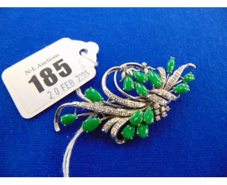 A Jade and Diamond brooch, set on 18ct White Gold