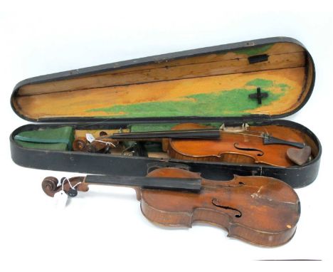 An Early 20th Century Violin, two -piece back, labelled ''Stradivarius"; another labelled "Giuseppe Marvinelli", condition po