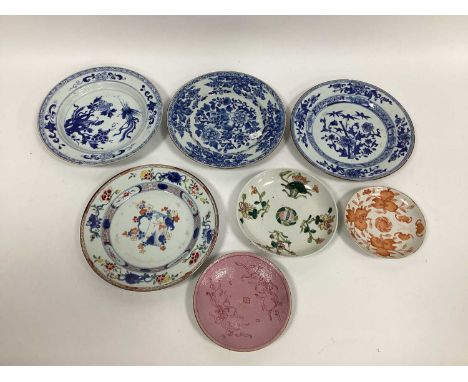 Four XIX Century Chinese Porcelain Plates, three with blue and white floral designs and one with famille rose pattern, 23cm d