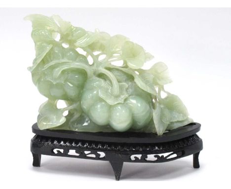 A Mid/Late XX Century Jadeite Carving of Gourds, hardwood stand, 19cmm high.