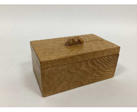 A Robert Thompson 'Mouseman' Adzed Oak Trinket Box and Cover, with carved mouse signature, 18.5cm long.no chips, good conditi