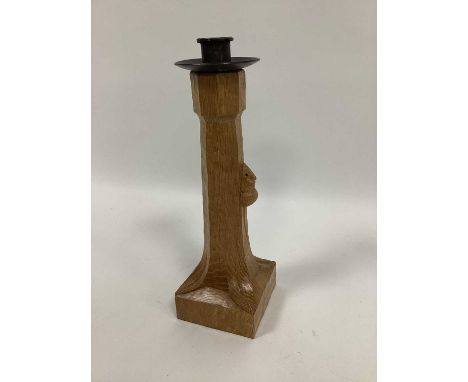 A Robert 'Mouseman' Thompson Oak Candlestick, of square base with carved mouse signature, sconce, 29cm high.tiny chip to mous