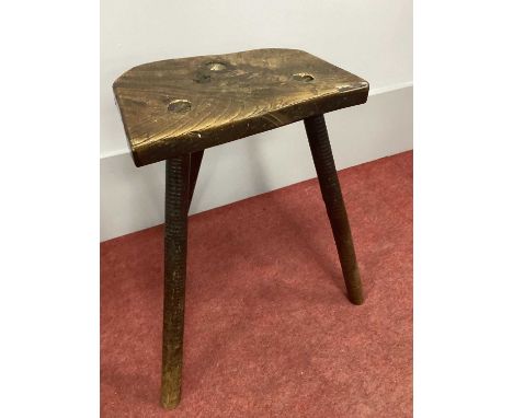 A XIX Century Elm Three Legged Cutler's Stool, 51cm high.