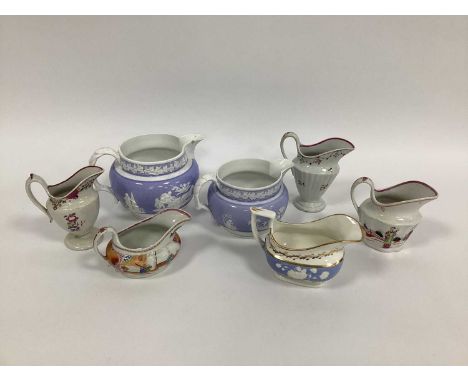 A Selection of Seven New Hall and Other XIX Century Porcelain Jugs, to include: two graduated jugs applied in white with cher