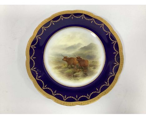 A Royal Worcester Cabinet Plate, painted by J. Stinton, signed, with Highland cattle in a misty mountainous landscape, within