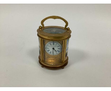 An Early XX Century Elliott &amp; Son, London Small Carriage Clock, of oval form, the side inset with panels painted with XVI