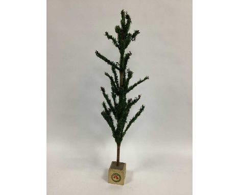 A Vintage Table Standing Christmas Tree, believed to have been purchased from Woolworths, with red berries and having block s