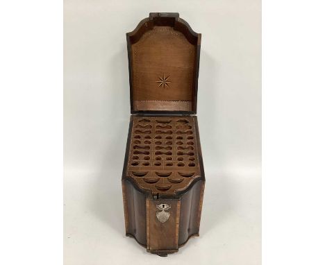 A George III Mahogany Knife Box, of serpentine outline, the hinged lid with shell inlaid medallion, the interior with fitted 