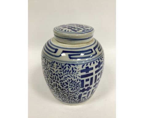 A XX Century Chinese Pottery Ginger Jar and Cover, decorated in blue with foliage and character symbols, 24cm high.SOME PITTI