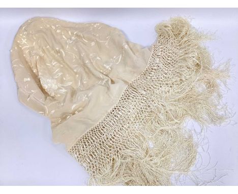 An Early XX Century Cream Piano Shawl, embroidered with flowers, long fringing to border, 100cm square (without fringing).