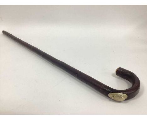 A Mid XX Century Walking Cane/Horse Measuring Stick, the white metal mount revealing an integral rule, 92cm long.white metal 